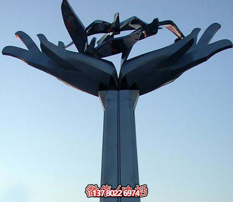 創(chuàng )意不銹鋼鴿子捧手雕塑 創(chuàng )意不銹鋼鴿子捧手雕塑