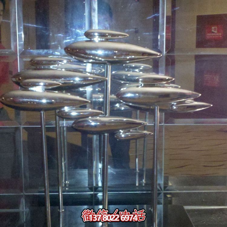 室內售樓部不銹鋼鏡面創(chuàng  )意抽象魚(yú)雕塑