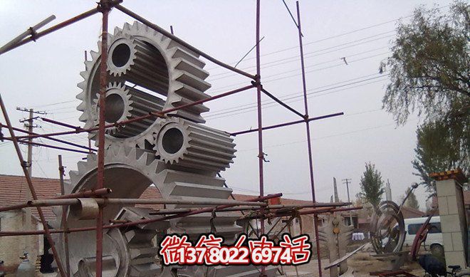 廠(chǎng)房創(chuàng  )意抽象形態(tài)個(gè)性的齒輪雕塑